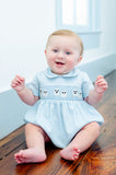 BOY WEARING SMOCKED BLUE GHOSTS BUBBLE