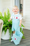 BOY WEARING SMOCKED MONSTERS OUTFIT