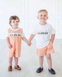 boys wearing smocked broncos t-shirt and shorts set and jonjon 