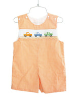 orange smocked broncos jonjon flat lay