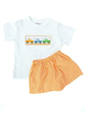 flat lay of orange smocked broncos t-shirt and shorts set