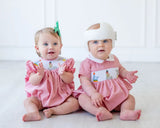 babies wearing smocked circus animals bubbles