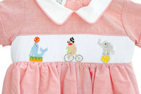 close up of smocked circus animals