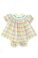 Colorful plaid with cute hand smocked caterpillars on a girls’ bloomer set.