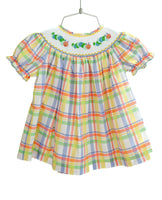 Colorful plaid with cute hand smocked caterpillars on a girls' dress!.