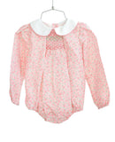 Flat lay of pink floral smocked girl's bubble