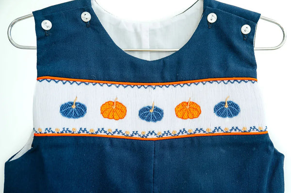 close up on smocked pumpkins on boy's jonjon