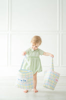 Hand-smocked blue bunny details make the Blue Smocked Bunnies Easter Basket a unique, heirloom-quality piece perfect for creating lasting memories.