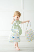 The Blue Smocked Bunnies Easter Basket has a sturdy handle with a 9" drop, making it easy for little ones to carry during Easter egg hunts.