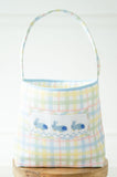 The Blue Smocked Bunnies Easter Basket features colorful pastel plaid fabric, beautifully accented with hand-smocked blue bunnies.