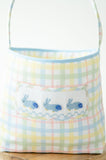 Made from soft, durable 100% cotton, the Blue Smocked Bunnies Easter Basket is designed for long-lasting use.