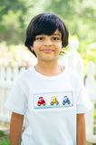 Close-up of smocked tractor embroidery detail on Ruth and Ralph Smocked Tractor T-Shirt