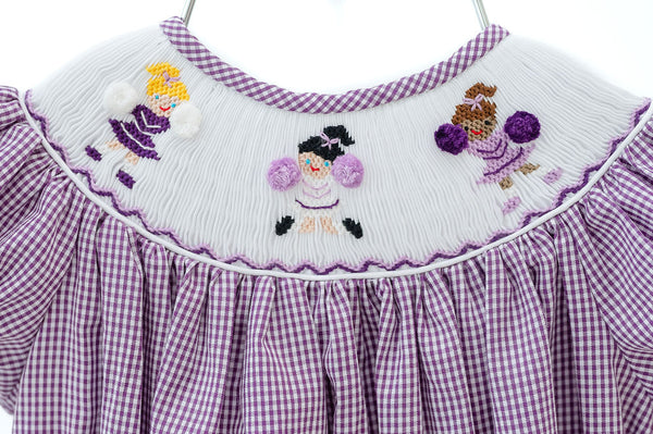 Smocked purple and white cheerleader dress and bubble to cheer on LSU or TCU! 