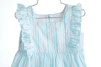 Perfect for Easter or any special occasion, the Blue Striped Bubble with ruffles is both stylish and practical for your toddler girl.