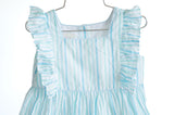 Perfect for Easter or any special occasion, the Blue Striped Bubble with ruffles is both stylish and practical for your toddler girl.