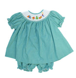 Close-up of teal gingham Bloomer set, featuring tent, campfire, tree, and canoe