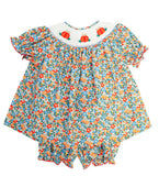 Smocked Floral Pumpkin Bloomer Set by Ruth and Ralph, blue floral print with bishop collar and bloomers, on hanger