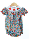 Smocked Floral Pumpkin Bubble by Ruth and Ralph, blue floral print with peter pan collar and smocked pumpkin embroidery, on hanger
