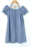 Smocked Hunting Season Dress by Ruth and Ralph, blue gingham with bishop collar, on hanger