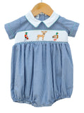 Smocked Hunting Bubble for Boys by Ruth and Ralph, blue gingham with peter pan collar and smocked deer and duck embroidery, on hanger
