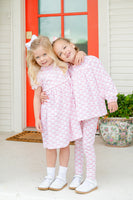 Two little girls wearing the Pink Bow Pima Dress will love the comfort and softness of 100% pima cotton.