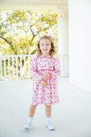 The dress, made from 100% pima cotton, ensures ultimate comfort and softness for your little one.