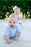 The soft blue color and heart details on the set make a baby wearing the Blue Hearts Layette Set look irresistibly cute and festive.