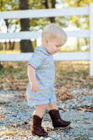 The Smocked Cowboy Toile Samuel Shirt/Shorts Set combines western charm with the practicality of smocked detailing for a comfortable fit.