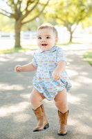 The Blue Cowboy Toile Pima Alexander Bubble blends timeless style with fun western-inspired details, making it a must-have for your toddler's wardrobe.