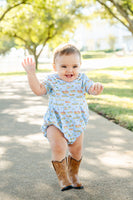 The lightweight fabric of the Blue Cowboy Toile Pima Alexander Bubble ensures that your toddler stays cool and comfortable while showcasing the adorable cowboy toile print.