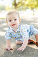 The cowboy toile print on the blue background adds a rustic and playful touch, making this romper perfect for any casual outing or playdate.