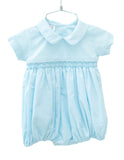 The Classic Blue Smocked Arthur Bubble has a crisp collar, adding a polished finish to the traditional Southern style.