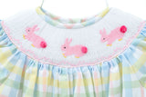 The Smocked Easter Bunnies Annabelle Bloomer Set features hand-smocked pink bunnies with cotton tails on soft pastel plaid fabric, adding a traditional touch.