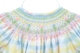 The Pastel Smocked Easter Plaid Dress is perfect for Easter, spring events, and special occasions.