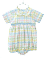 The Pastel Smocked Easter Plaid Arthur Bubble features a soft, pastel plaid design with delicate hand-smocked detailing.