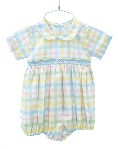 The Pastel Smocked Easter Plaid Arthur Bubble features a soft, pastel plaid design with delicate hand-smocked detailing.