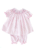 The heirloom-quality construction of the Pink Golf Smocked Bloomer Set ensures it will be a lasting piece in her wardrobe.