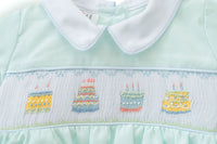 Celebrate in style with the smocked mint green birthday cake bubble, a charming outfit for any birthday occasion.