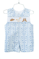 The smocked Jonjon features a classic bandana print with boots accents, giving it a playful, western-inspired flair.