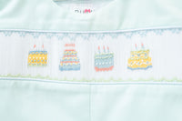 Celebrate in style with the smocked birthday cake T-shirt and mint green shorts, perfect for creating sweet birthday memories.