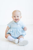 The Classic Blue Smocked Arthur Bubble is made from a soft blend of 65% polyester and 35% cotton for comfort and durability.