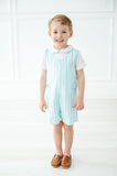 With its soft cotton fabric, the Blue Striped Jonjon keeps a little boy comfortable while he enjoys springtime fun.