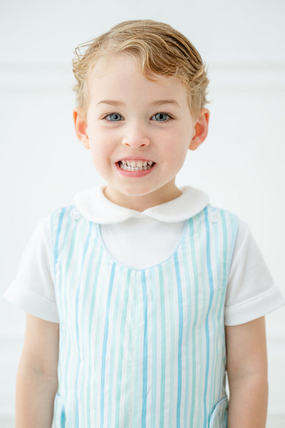 A little boy wearing the Blue Striped Jonjon will look dashing in its timeless blue stripes and classic silhouette.