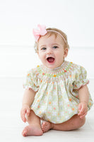 Whether for a spring outing or family gathering, a toddler girl in this smocked bubble will always look adorable.