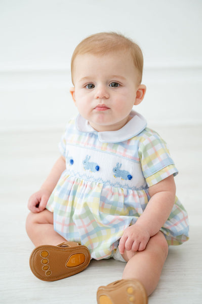 The Smocked Easter Bunnies Bubble for baby and toddler boys is a charming, traditional piece perfect for Easter celebrations.