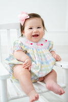 The Smocked Easter Bunnies Birdie Bubble is available in sizes 3M to 2T, making it perfect for babies and toddlers.