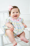 The Smocked Easter Bunnies Birdie Bubble is available in sizes 3M to 2T, making it perfect for babies and toddlers.