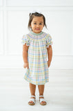 The Pastel Smocked Easter Plaid Dress is available in sizes 12M to 8, making it a versatile option for young girls.