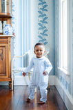 boy wearing blue coverall playsuit