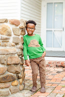 boy wearing brown corduroy pants.